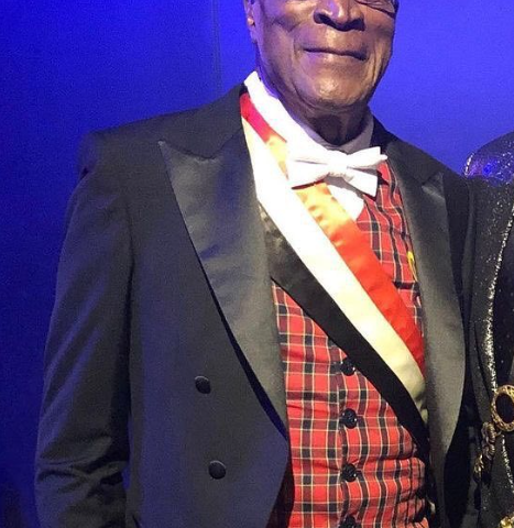 What religion is John Amos
